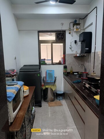 Kitchen in 1.5 BHK Apartment at New Ambivali, Andheri West – for Rent