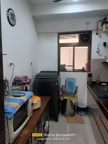 Master Bedroom in 1.5 BHK Apartment at New Ambivali, Andheri West – for Rent