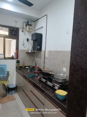 Kitchen in 1.5 BHK Apartment at New Ambivali, Andheri West – for Rent