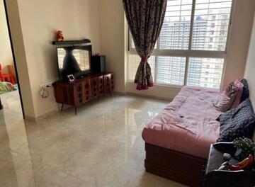 Living Room in 2 BHK Apartment at Lodha Amara, Kolshet Road – for Rent