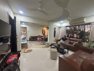 Living Room in 4 BHK Apartment at United Unity Heights, Malad West – for Rent