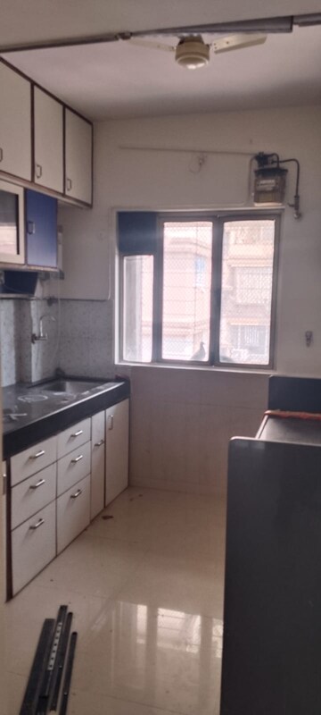 Kitchen in 3 BHK Apartment at Acme Complex 2A, Goregaon West – for Rent