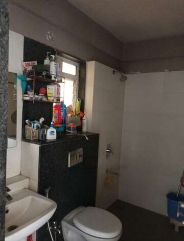 Bathroom in 2 BHK Apartment at Rustomjee Urbania, Majiwada – for Rent