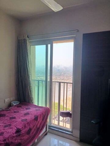 Bedroom in 2 BHK Apartment at Rustomjee Urbania, Majiwada – for Rent