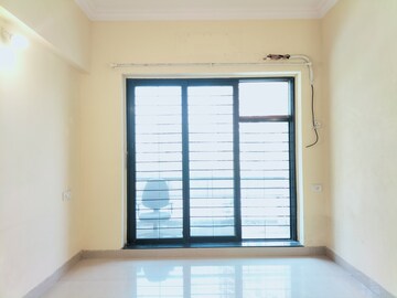 Room in 1 BHK Apartment at K Raheja Heights, Malad East – for Rent