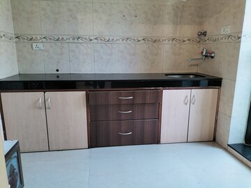 Kitchen in 1 BHK Apartment at K Raheja Heights, Malad East – for Rent