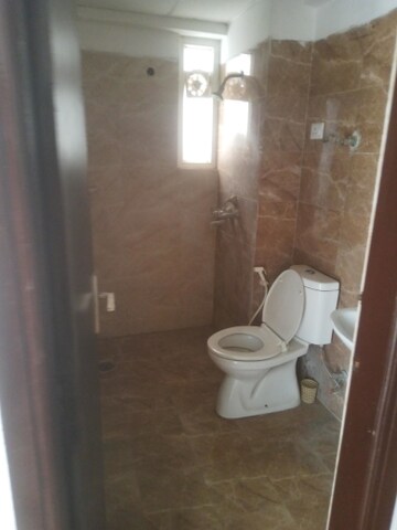 Bathroom in 3 BHK Apartment at Nirala Estate, Tech Zone 4 Greater Noida – for Rent