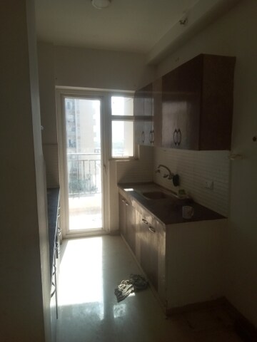 Kitchen in 3 BHK Apartment at Nirala Estate, Tech Zone 4 Greater Noida – for Rent