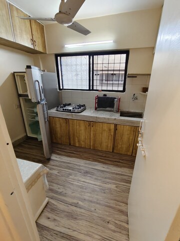 Kitchen in 2 BHK Apartment at Yogi Park CHS Koregaon, Koregaon – for Rent