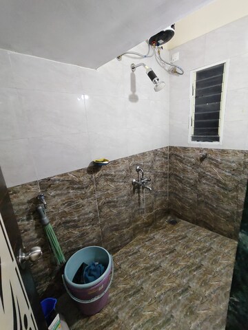 Bathroom in 2 BHK Apartment at Yogi Park CHS Koregaon, Koregaon – for Rent