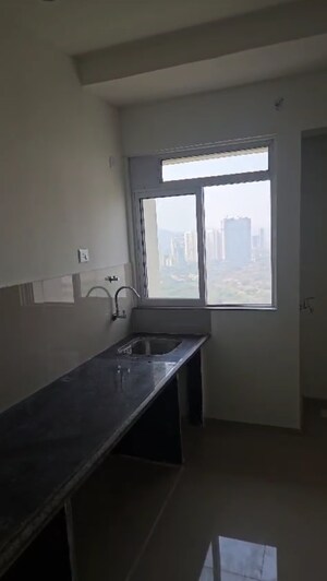 Kitchen in 1 BHK Apartment at Puraniks City Reserva, Ghodbunder Road – for Sale
