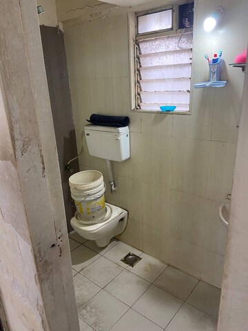 Bathroom in 1 BHK Apartment at Gaurav Woods, Mira Road – for Rent