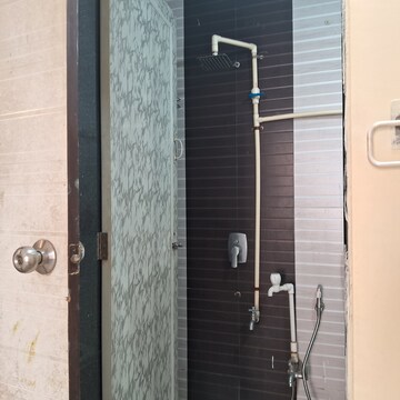 Bathroom in 1 BHK Apartment at Suyash Swaraj, Kopar Khairane – for Rent