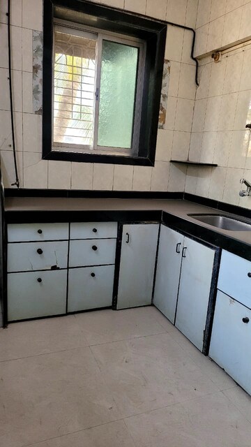 Kitchen in 1 BHK Apartment at The Tenants CHS, Sion – for Rent
