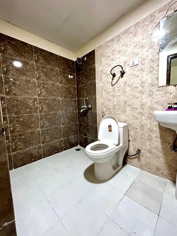 Bathroom in 2 BHK Apartment at JKG Palm Resort, Raj Nagar Extension – for Sale