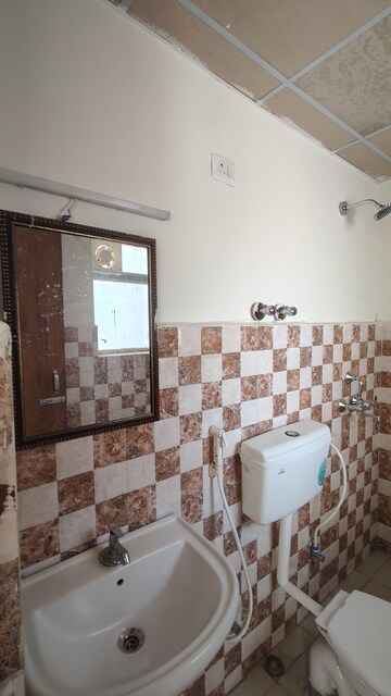 Bathroom in 2 BHK Apartment at Pivotal Paradise, Sector 62 – for Rent