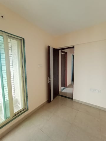 Room in 2 BHK Apartment at Mohan Willows, Badlapur East – for Sale
