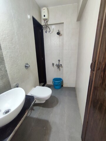 Bathroom in 1 BHK Apartment at Vihang Valley Phase 3, Kasarvadavali – for Rent