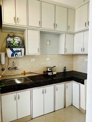 Kitchen in 2 BHK Apartment at JKG Palm Resort, Raj Nagar Extension – for Sale