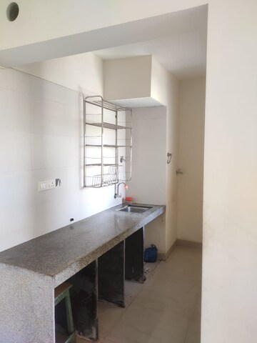 Kitchen in 1 BHK Apartment at Lodha Palava Downtown, Dombivli East – for Sale