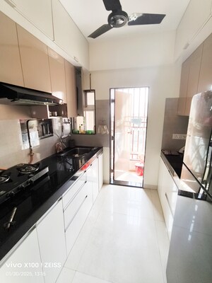Kitchen in 1 BHK Apartment at Vedant Shree Gopinath Sublime, Kalwa – for Sale