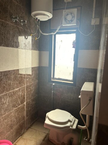 Bathroom in 1 RK Apartment at Emaar Emerald Floors Premier, Sector 65 – for Rent