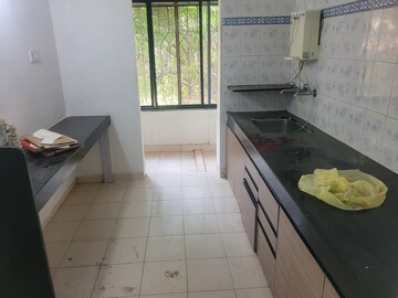 Kitchen in 2 BHK Apartment at Kusum Kunj, Prabhat Road – for Rent