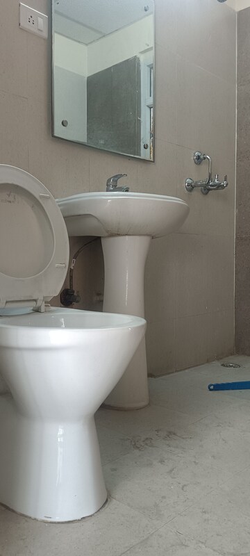 Attached Bathroom in 2.5 BHK Apartment at Sikka Karmic Greens, Sector 78 – for Rent