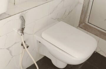 Bathroom in 1 BHK Apartment at Kakad Paradise Phase 1, Mira Road – for Rent