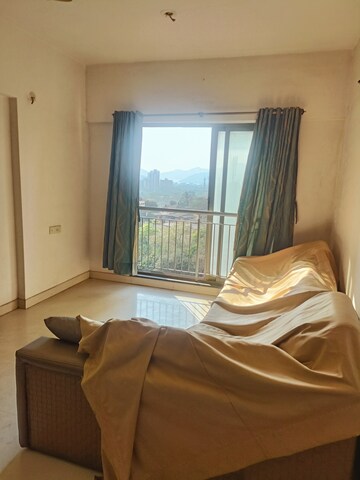Living Room in 1 BHK Apartment at Lodha Splendora, Ghodbunder Road – for Sale
