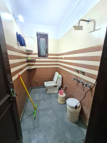 Bathroom in 3 BHK Builder Floor at Dwarka Mor – for Rent