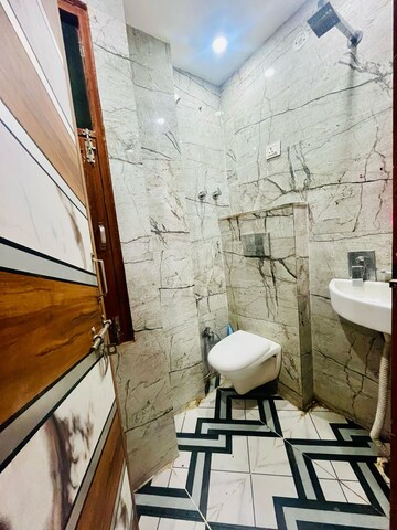 Bathroom in 2 BHK Builder Floor at Dwarka Mor – for Rent