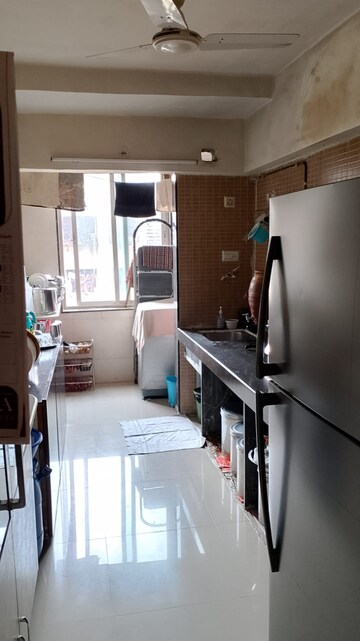 Kitchen in 2 BHK Apartment at Kamanwala Manavsthal, Malad West – for Rent