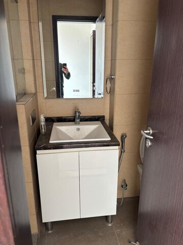 Bathroom in 4 BHK Apartment at Mahindra Luminare, Sector 59 – for Rent