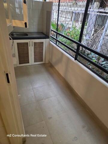 Utility Room in 3 BHK Apartment at Chartered Court, Richmond Road – for Rent