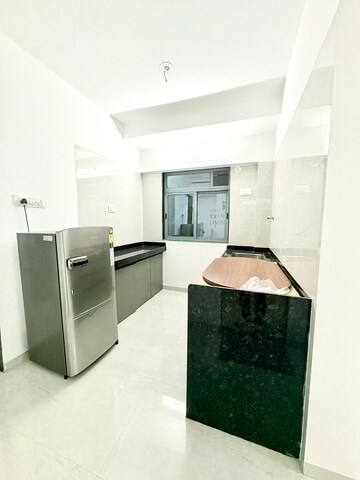 Kitchen in 1 BHK Apartment at Unique Sky City, Yashavant Nagar – for Sale