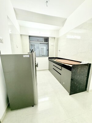 Kitchen in 1 BHK Apartment at Unique Sky City, Yashavant Nagar – for Sale