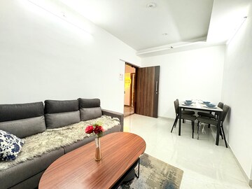 Living Room in 1 BHK Apartment at Unique Sky City, Yashavant Nagar – for Sale