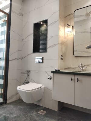 Bathroom in 3 BHK Builder Floor at Nehru Enclave – for Sale