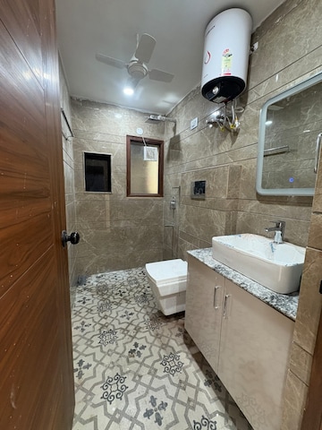 Bathroom in 4 BHK Builder Floor at East Of Kailash – for Rent