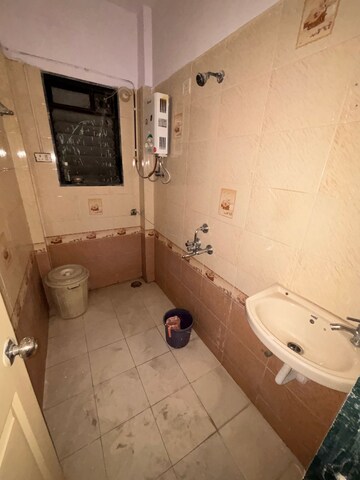 Bathroom in 1 BHK Apartment at Giriraj CHS Goregaon, Goregaon East – for Rent