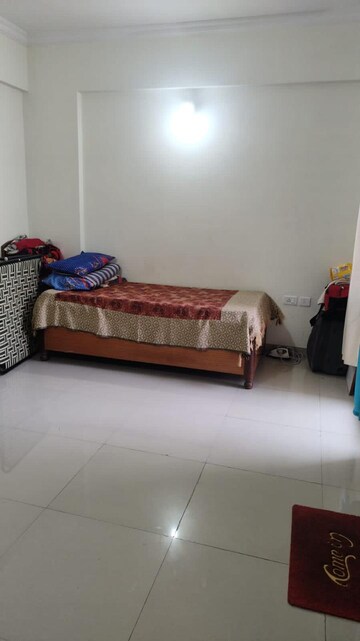 Bedroom in 2 BHK Apartment at AWHO Vijay Vihar, Wagholi – for Rent