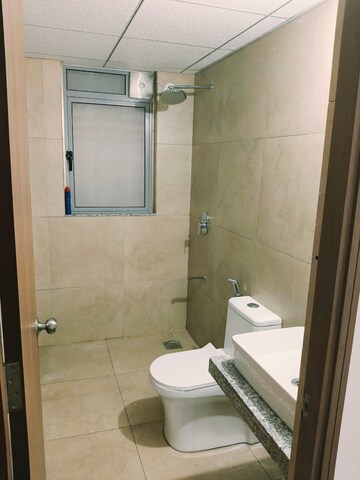 Bathroom in 2 BHK Apartment at Kalpataru Immensa, Kolshet Road – for Rent