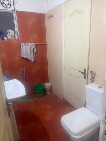 Bathroom in 2 BHK Apartment at Sushma Elite Cross, Dhakoli Village – for Rent
