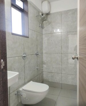 Bathroom in 1.5 BHK Apartment at New Ambivali, Andheri West – for Sale