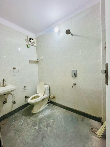 Bathroom in 2 BHK Builder Floor at Dwarka Mor – for Rent