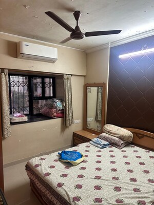 Bedroom in 2 BHK Apartment at Ani Anu Sri Balaji Enclave, Malad West – for Sale