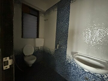 Bathroom in 2 BHK Apartment at Earth Terrace, Goregaon West – for Rent