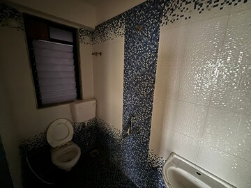 Bathroom in 2 BHK Apartment at Earth Terrace, Goregaon West – for Rent