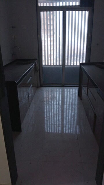 Kitchen in 2 BHK Apartment at Ani Anu Sri Balaji Enclave, Malad West – for Sale